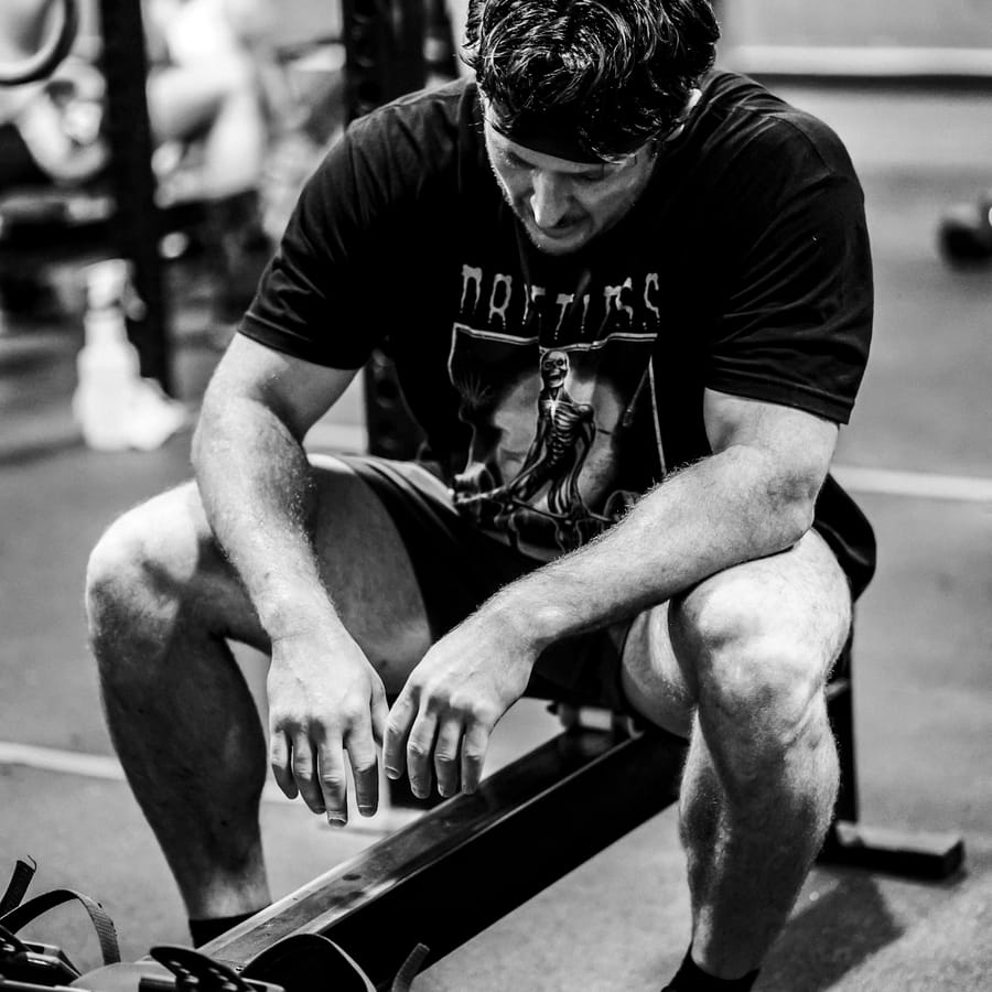 A black-and-white gym photo after a rowing workout.